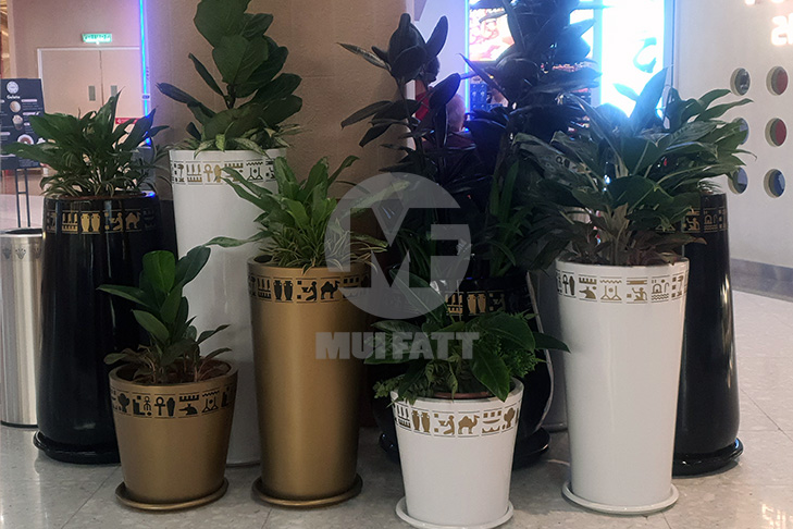 Custom FRP Planters with Unique Egyptian-Inspired Detailing – High-quality fiberglass planter pots designed for Sunway Pyramid’s indoor landscaping project, featuring sleek gold, black, and white finishes.