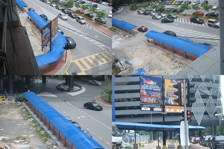 Overhead View of Installed FRP Walkway Canopy – Aerial view showcasing a completed blue FRP pedestrian walkway roofing alongside a busy road.