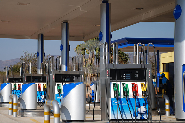 Sasol Gas Station with FRP Cladding and Pump Island Protection – A well-designed fuel station featuring FRP-clad pump islands, modern fueling equipment, and safety bollards for durability and aesthetics.